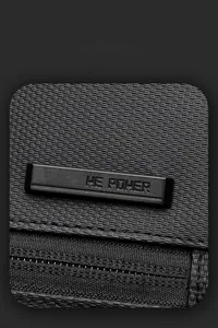 Macro shot of durable textured fabric and matte WEPOWER logo plate on casual backpack