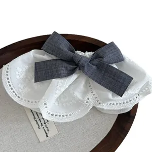 Elegant white lace bow hair clip with navy plaid ribbon in vintage Korean style