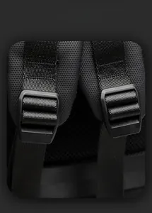 Detail of adjustable strap buckle on high-density black nylon backpack with smart storage