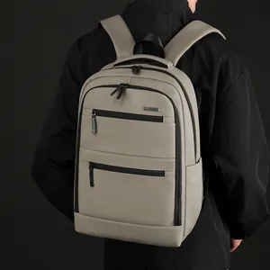 Light taupe casual business backpack with multiple zippers for laptop and travel