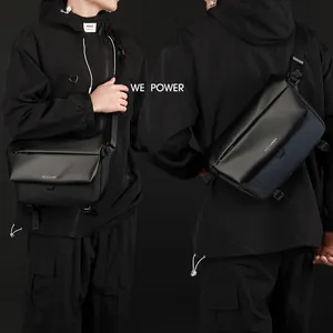 Minimalist black tactical messenger bag with adjustable shoulder strap for urban commuting
