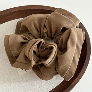 French vintage oversized scrunchie in premium solid brown fabric with ruffled edges