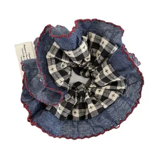 Navy denim and plaid oversized scrunchie with red wavy edge and fabric label