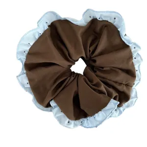 Blue and brown striped scrunchie with polka dot wave edge for stylish ponytails
