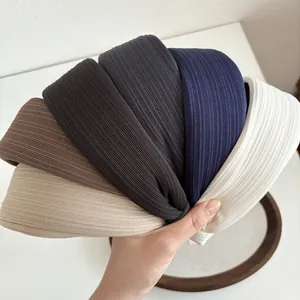 Detail of multi-colored padded headbands showing thick ribbed texture and soft fabric