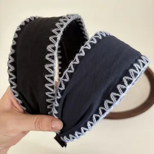 Retro black wide fabric headband with grey hand-stitched wool edge and anti-slip teeth