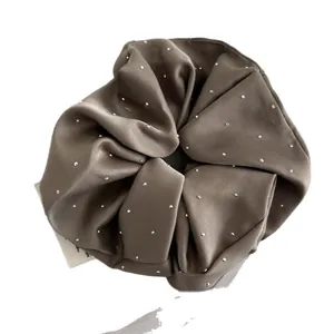 Elegant brown satin scrunchie with sparkling rhinestones for women's hair styling