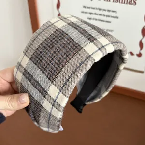 Macro shot of wide plaid headband texture with vintage brushed fabric in classic check pattern