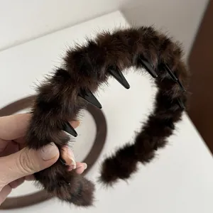 Deep brown plush headband with inner teeth for volume and secure non-slip styling