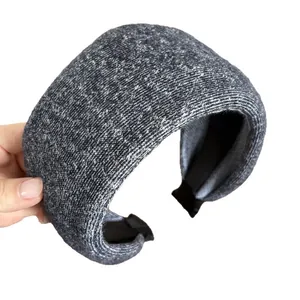 Grey knitted wide sponge headband for women with high top volume and textured marled fabric