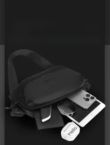 Detailed interior of black waterproof crossbody bag showing multi-layer storage capacity