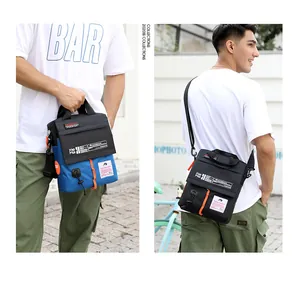Detail of waterproof canvas messenger bag with adjustable strap and top handle