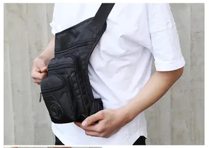 Close-up of waterproof tactical leg bag used as a crossbody chest pack for outdoor cycling