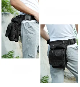 Detail of a black nylon tactical drop leg bag with multi-pocket design on an outdoor model