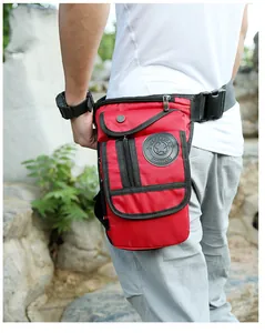 Detailed view of red nylon tactical leg bag with adjustable straps and star logo on thigh