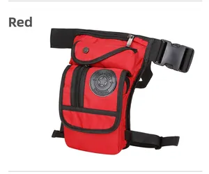 Close-up of red nylon leg bag with multiple zipper compartments and adjustable straps