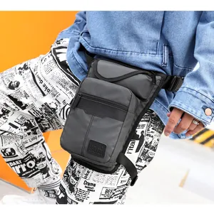 Detailed view of dark grey tactical leg bag worn on waist with adjustable buckles and straps