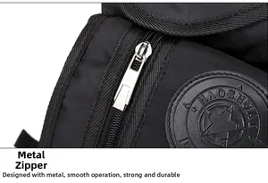 Detailed macro view of durable metal zipper and logo on black nylon tactical leg bag