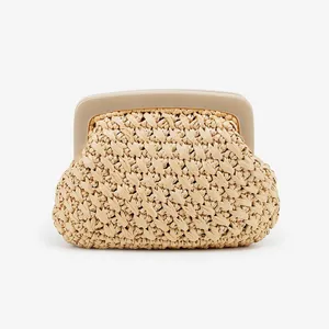 Elegant handmade woven straw clutch bag with cream acrylic frame for evening gala