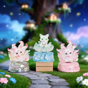 Mythical fox resin figures in pink, blue, and purple set against a fantasy forest scene