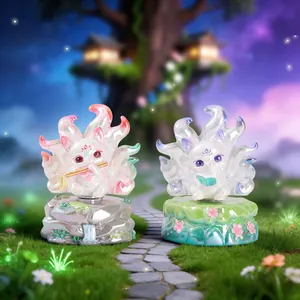 Rotating Nine-Tailed Fox statues with pearlescent finish in a fantasy forest scene