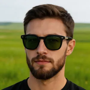 Close-up of male model wearing vintage square sunglasses with green lenses and gold accents