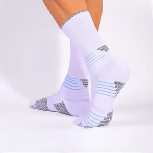 Detail of white basketball socks with blue stripes featuring breathable mesh and anti-slip yarn