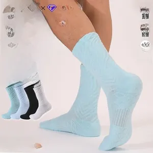 Detail of professional basketball socks showing thick cushioned sole and breathable texture