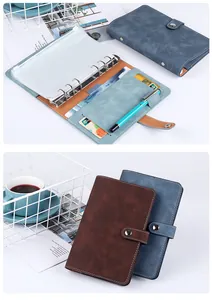 Detail of A6 binder showing multi-functional card slots and transparent zipper pouches