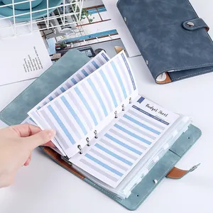 A6 faux suede budget binder with 6-ring metal clips and transparent cash envelopes