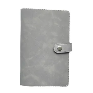Minimalist A6 gray notebook cover with premium leather texture and silver snap fastener