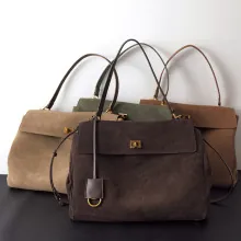 Retro suede leather tote bags in various earth tones with gold-tone hardware