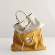 Premium vintage genuine leather tote bags in white and yellow stacked arrangement