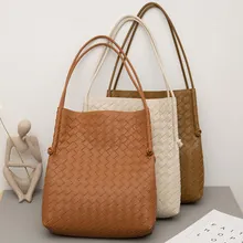 Three retro large capacity woven leather tote bags in brown cream and olive green colors