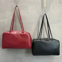 Two vintage genuine leather Boston bags in red and black with large capacity handles