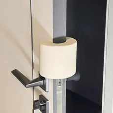 Close-up of soft C-shaped foam door stopper for baby finger safety protection