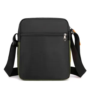 Men's crossbody bag in black and olive green nylon with adjustable wide shoulder strap