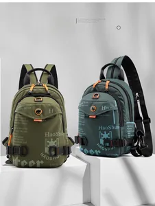 Detail of waterproof nylon multi-functional chest bag with vibrant orange zipper pulls