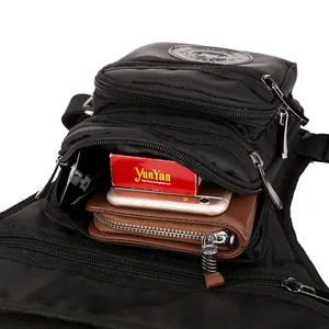 Black tactical leg bag with multi-layer zipper pockets showing large storage capacity
