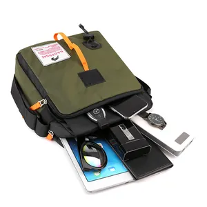 Tactical army green crossbody bag for men showing spacious storage for iPad and essentials