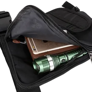 Multifunctional nylon leg bag showing interior storage for wallet, phone and flashlight