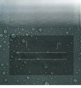Detailed close-up of water-resistant nylon fabric showing water droplets on the surface
