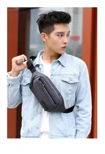 Close-up of gray outdoor belt bag for men featuring durable high-density oxford fabric