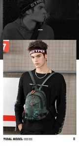 Close-up of dark green nylon chest bag featuring orange zippers and HaoShuai logo print