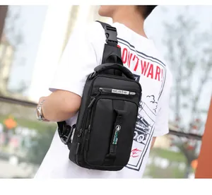 Detailed side view of a black multi-pocket crossbody chest bag with adjustable strap