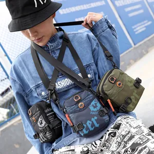 Sacoche homme tendance en noir, vert et bleu marine avec sangle d'épaule réglable