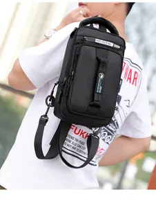 Tactical black crossbody chest bag with USB port shown on a model in an urban setting