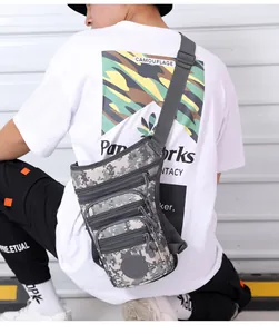 Detail view of the waterproof oxford drop leg bag with digital camo and triple zippers