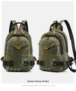 Front and side view of military green waterproof nylon chest bag with orange zipper pulls