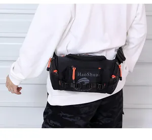 Detail of waterproof nylon waist bag with orange zipper pullers on a male model
